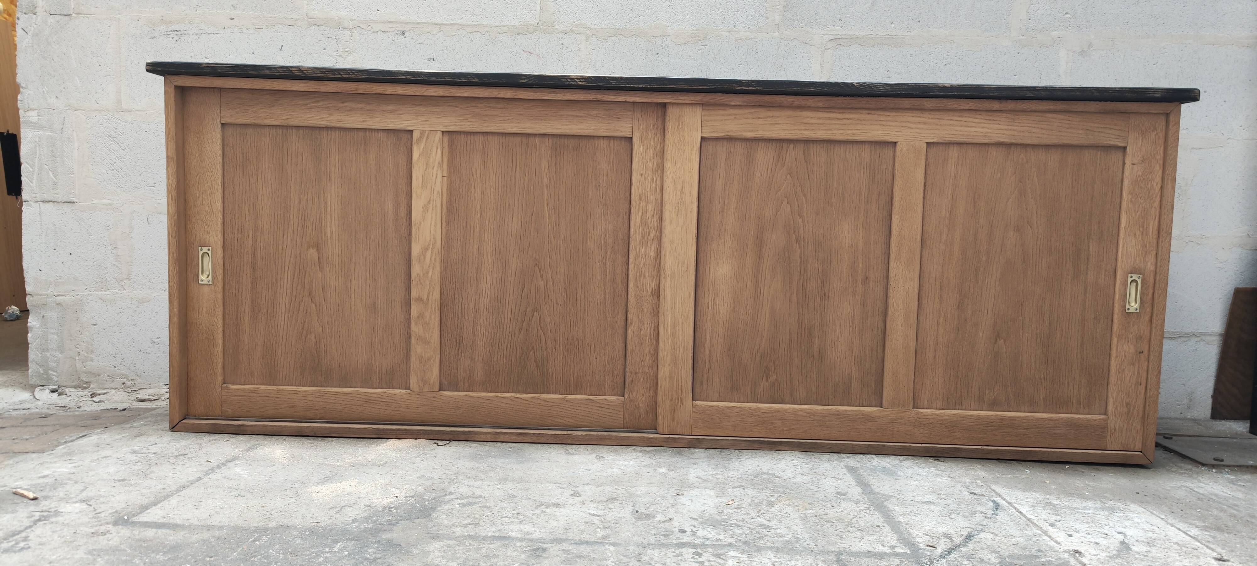 Old rear oak counter unit with two sliding doors