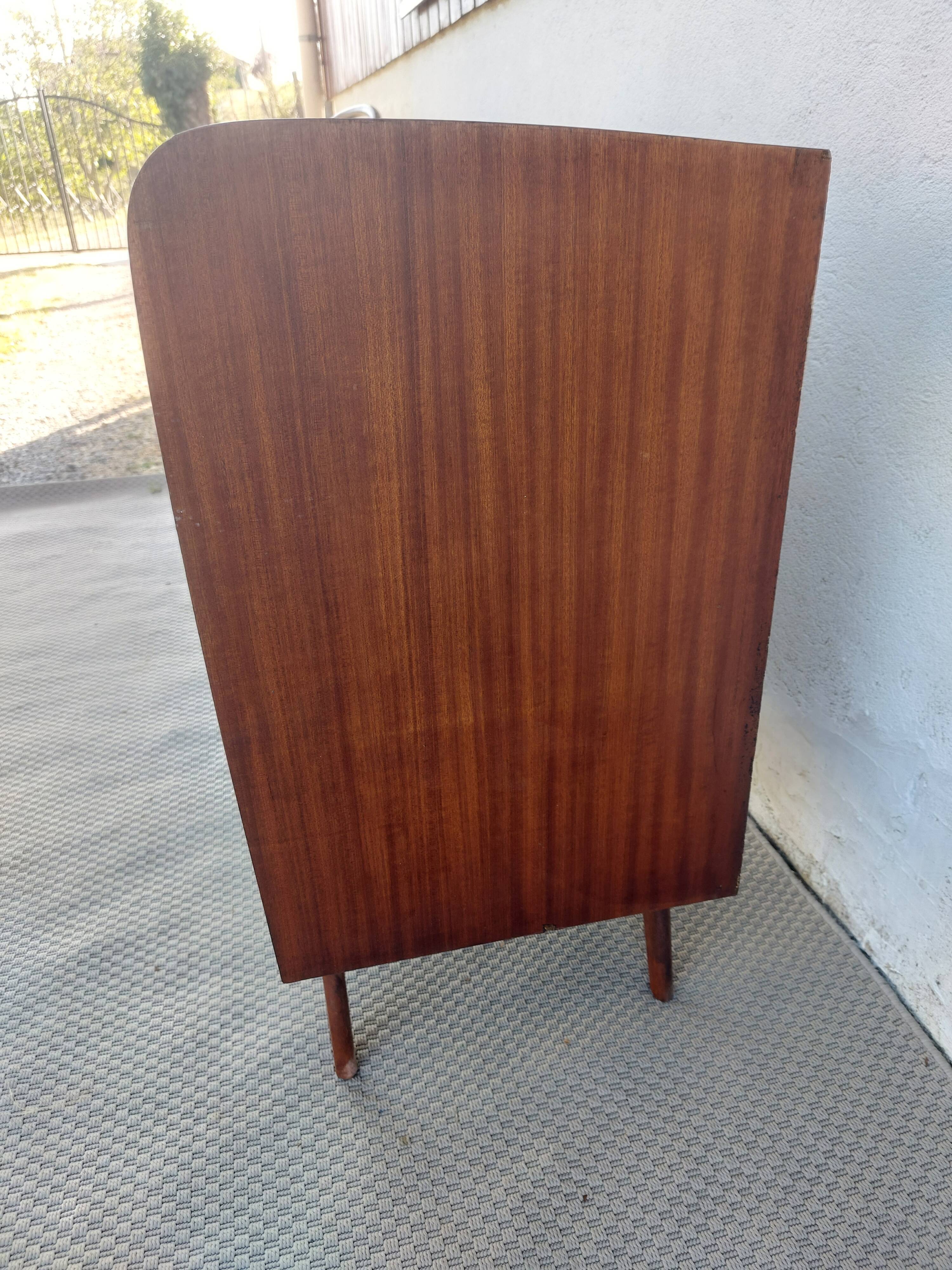 commode aux pieds compas, effet miroir, vintage