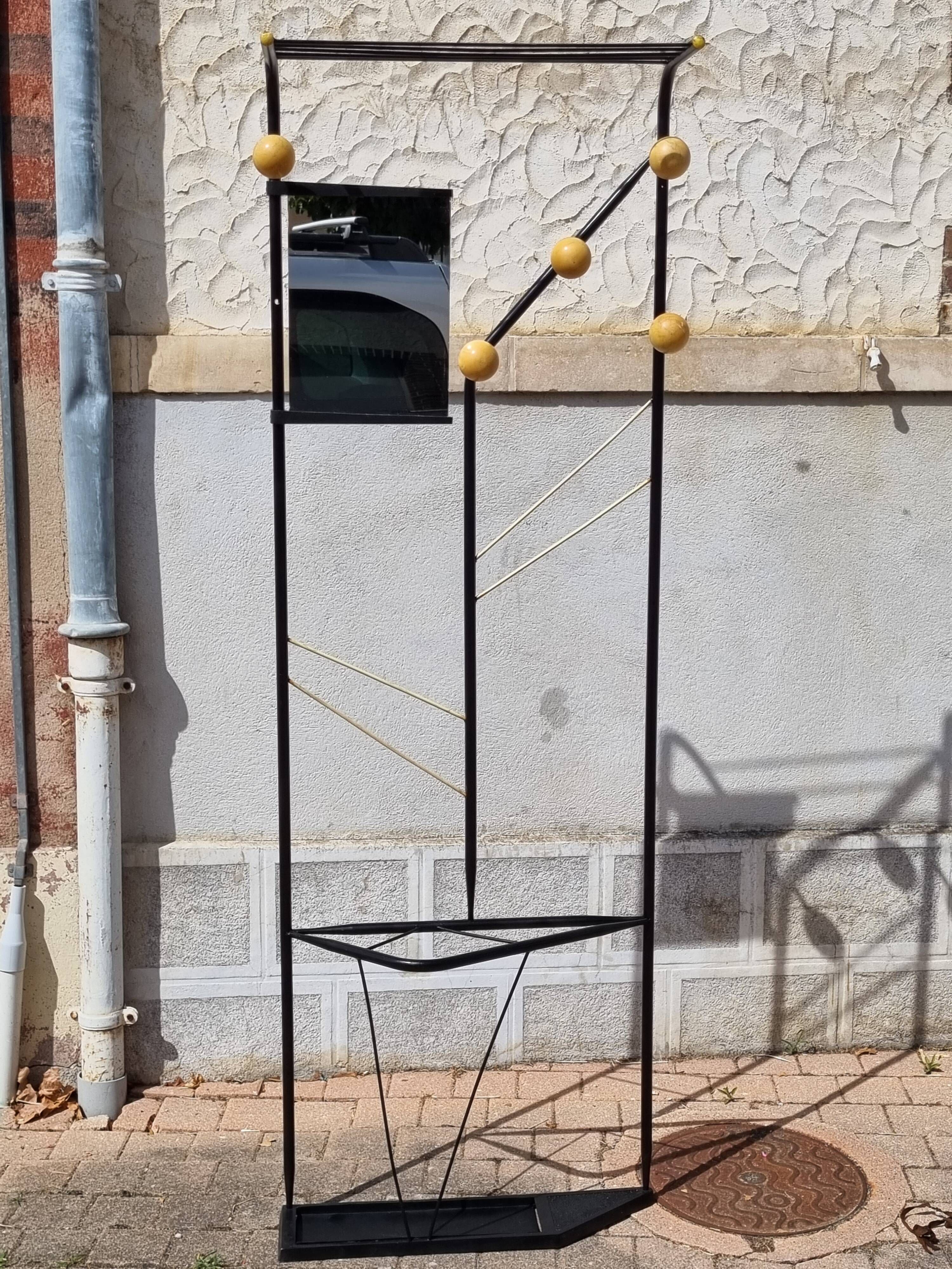 Postmodern entrance wardrobe from the 1980s in black metal and Bakelite, 180 cm.