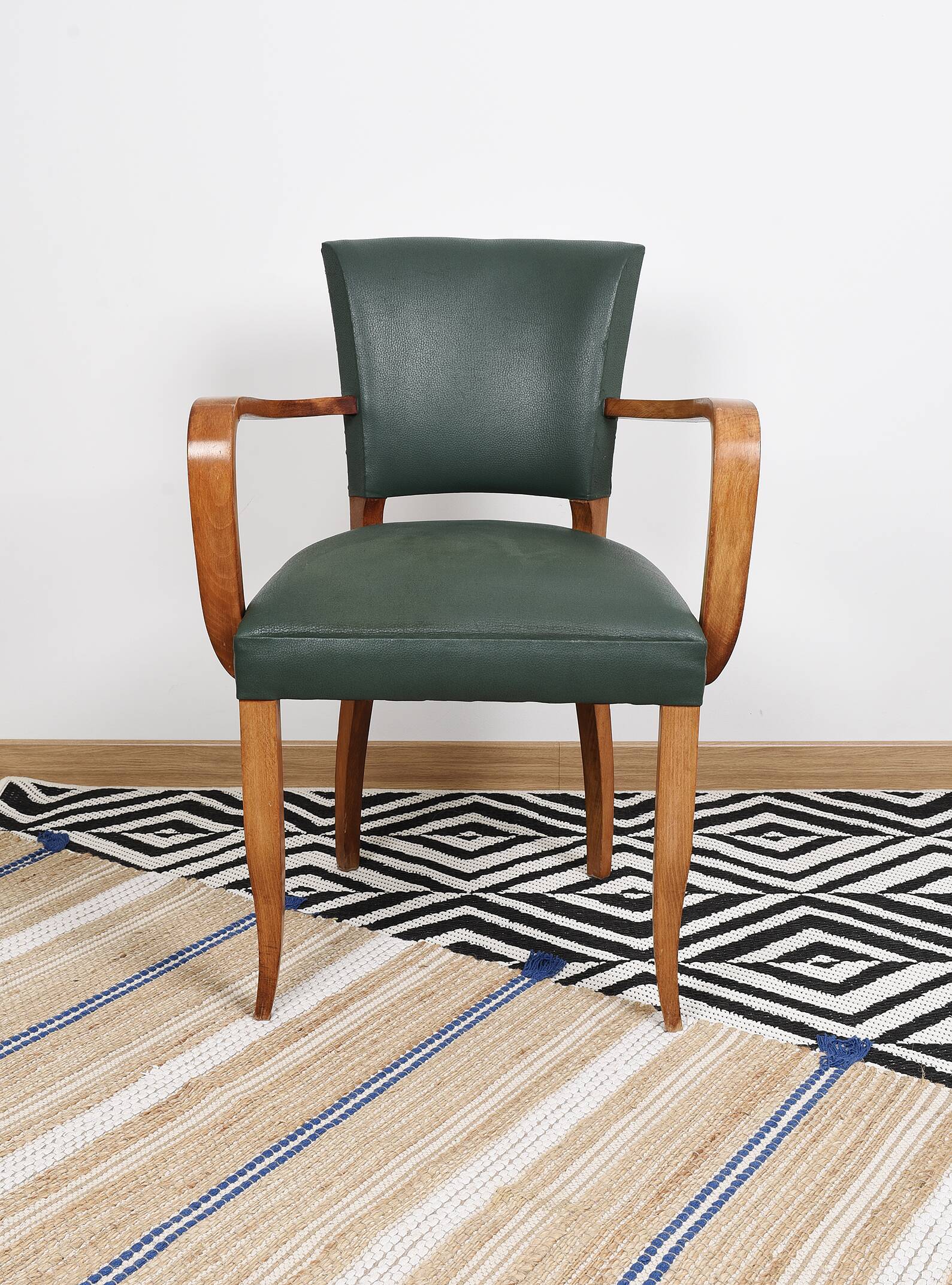 Bridge armchair in green moleskin