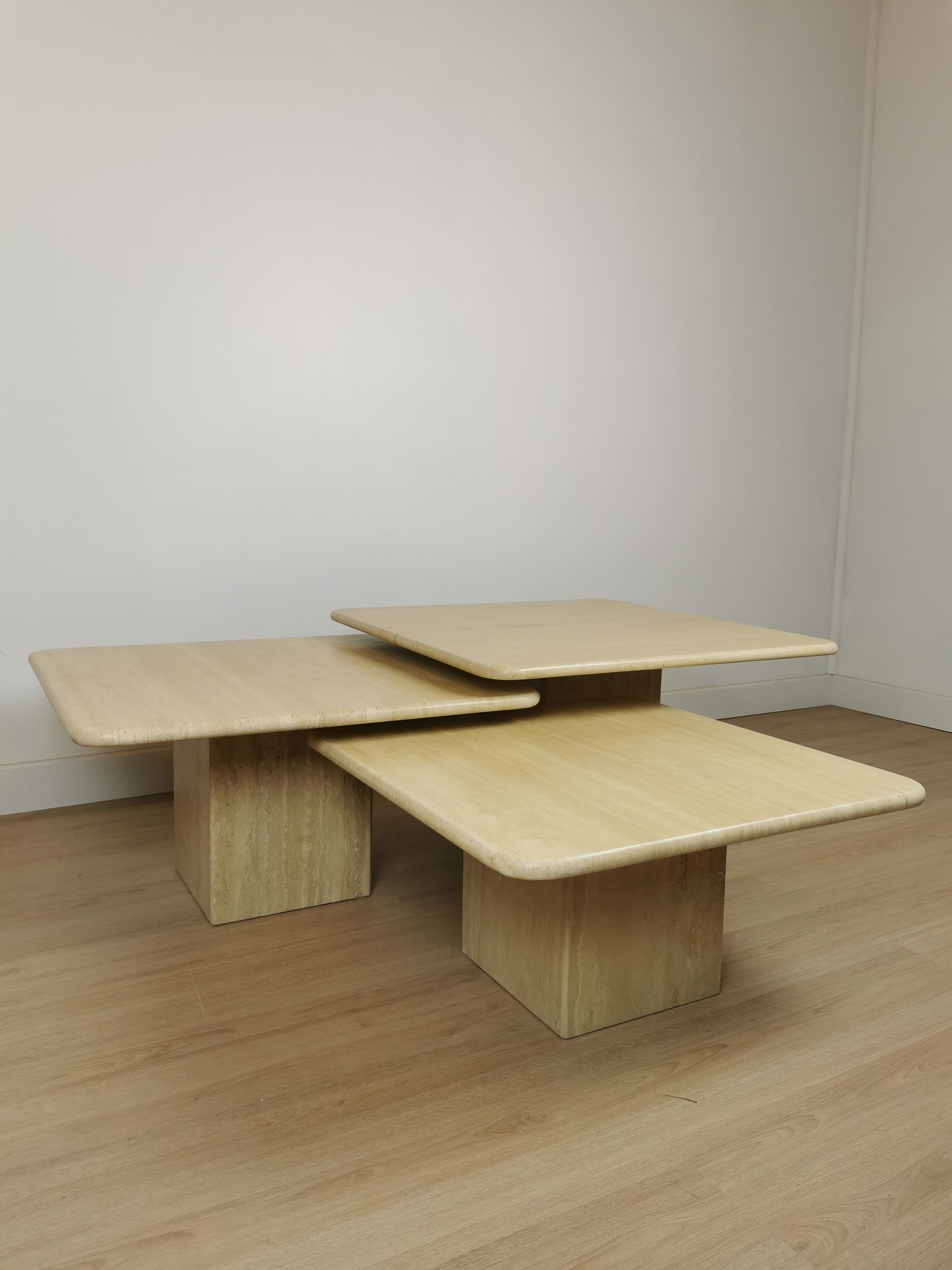 Side tables in travertine 70s