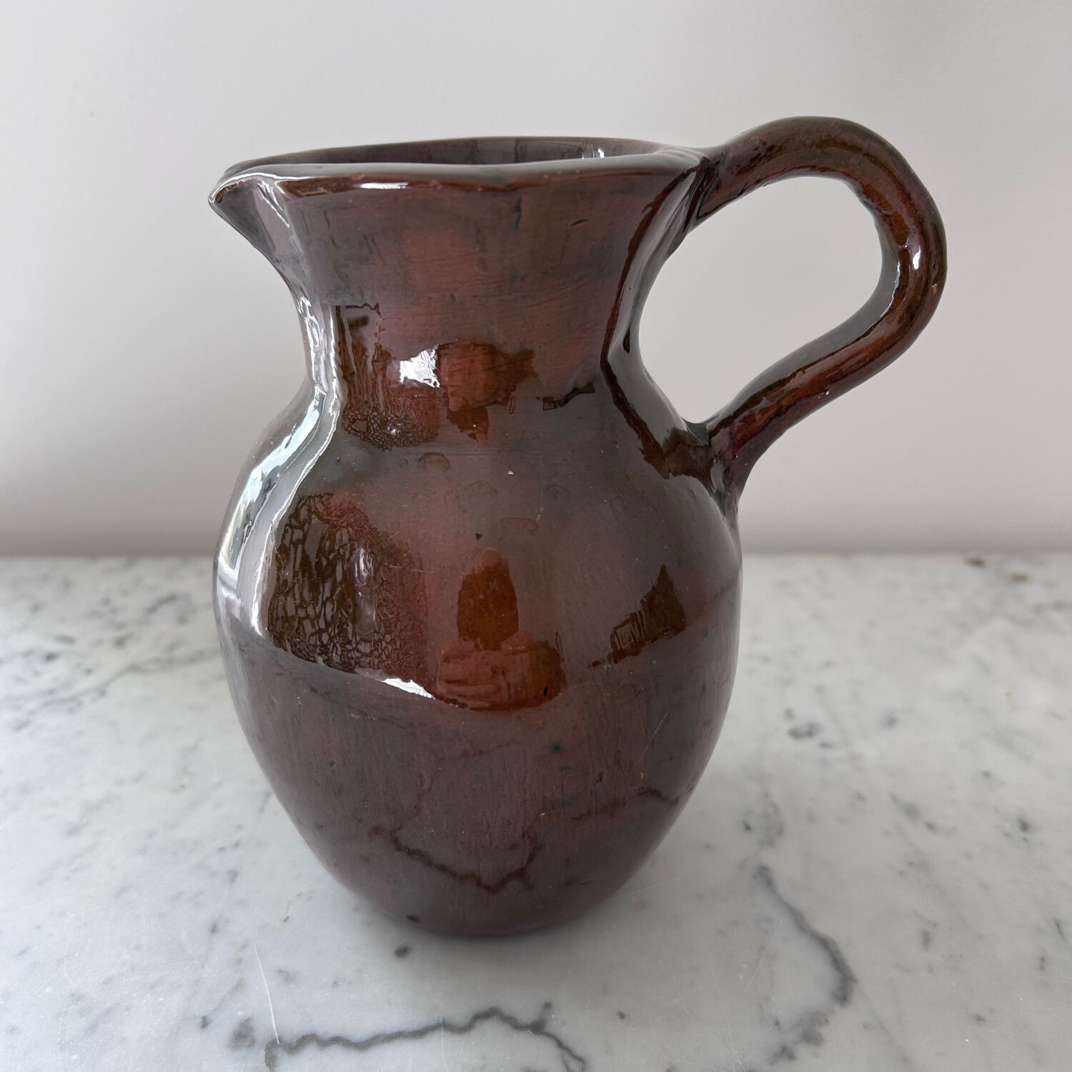 Old signed artisanal pitcher