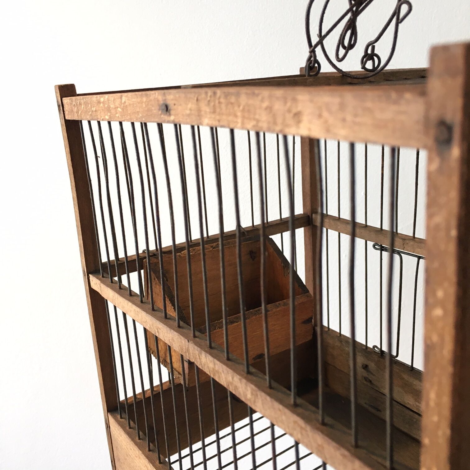 Former wooden birdcage