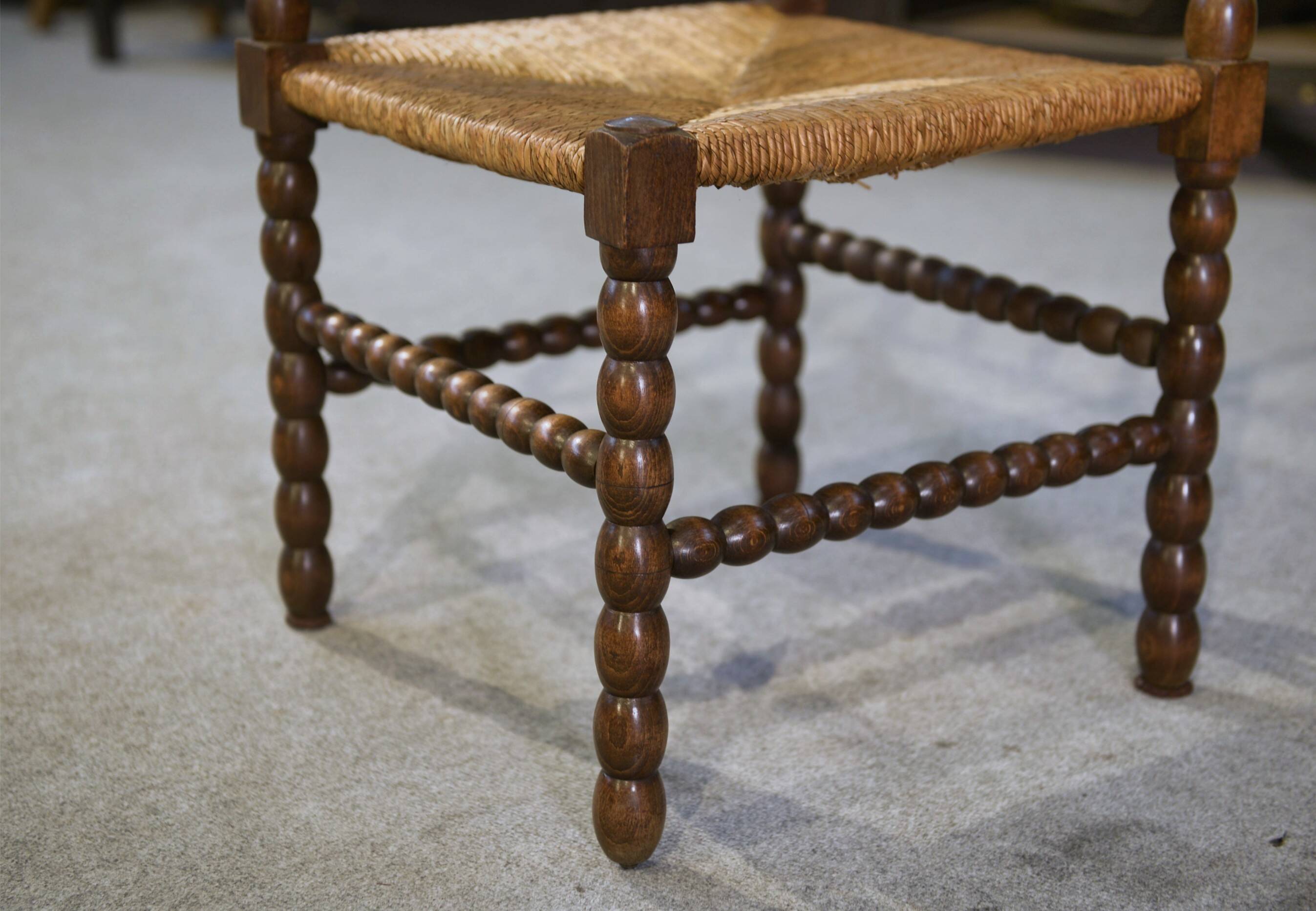 Pair of turned wooden corner chairs from the 1950s.