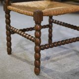 Pair of turned wooden corner chairs from the 1950s.