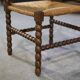 Pair of turned wooden corner chairs from the 1950s.