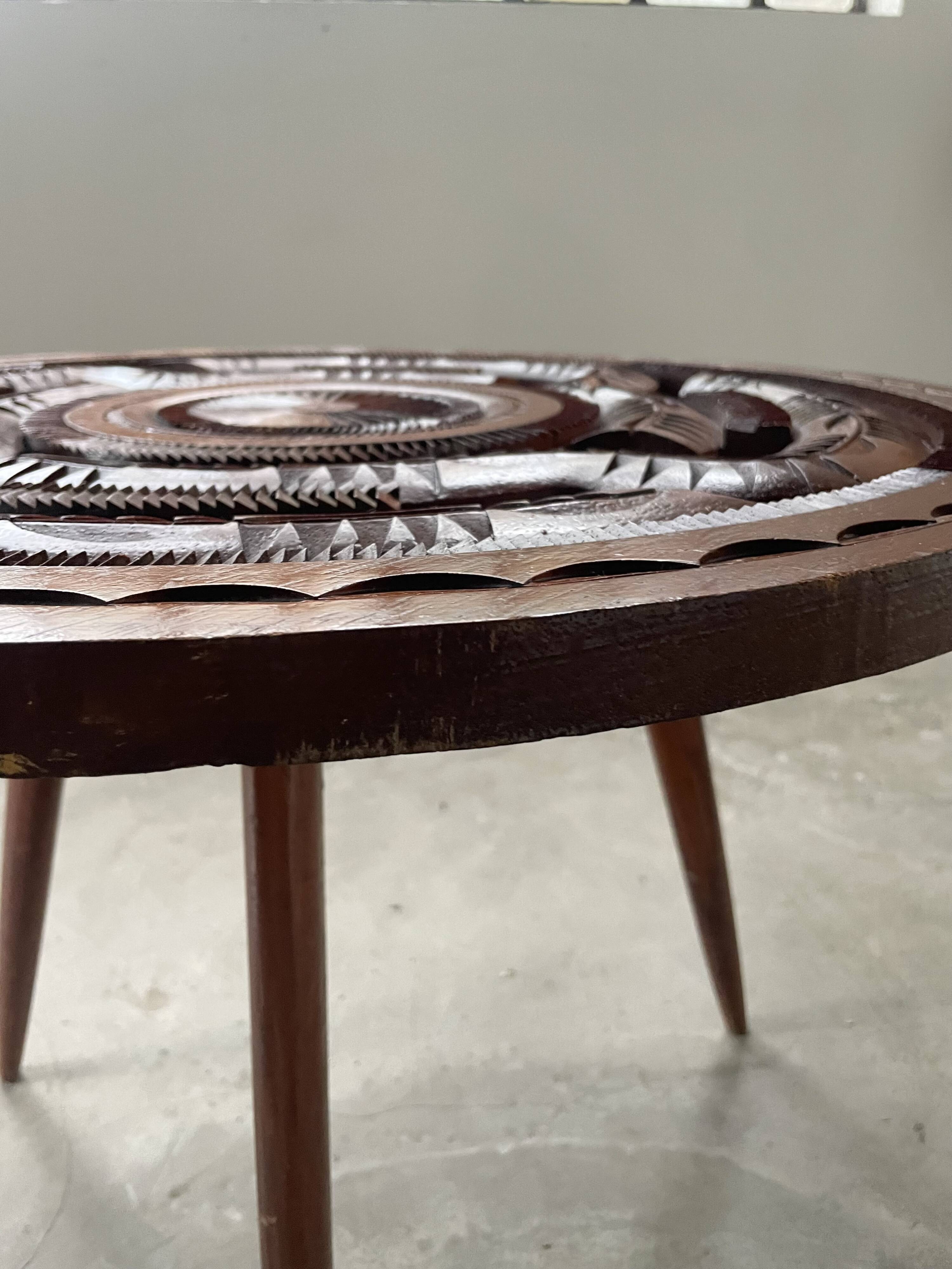 60s tripod coffee table in chiseled wood