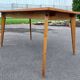 Table pieds compas