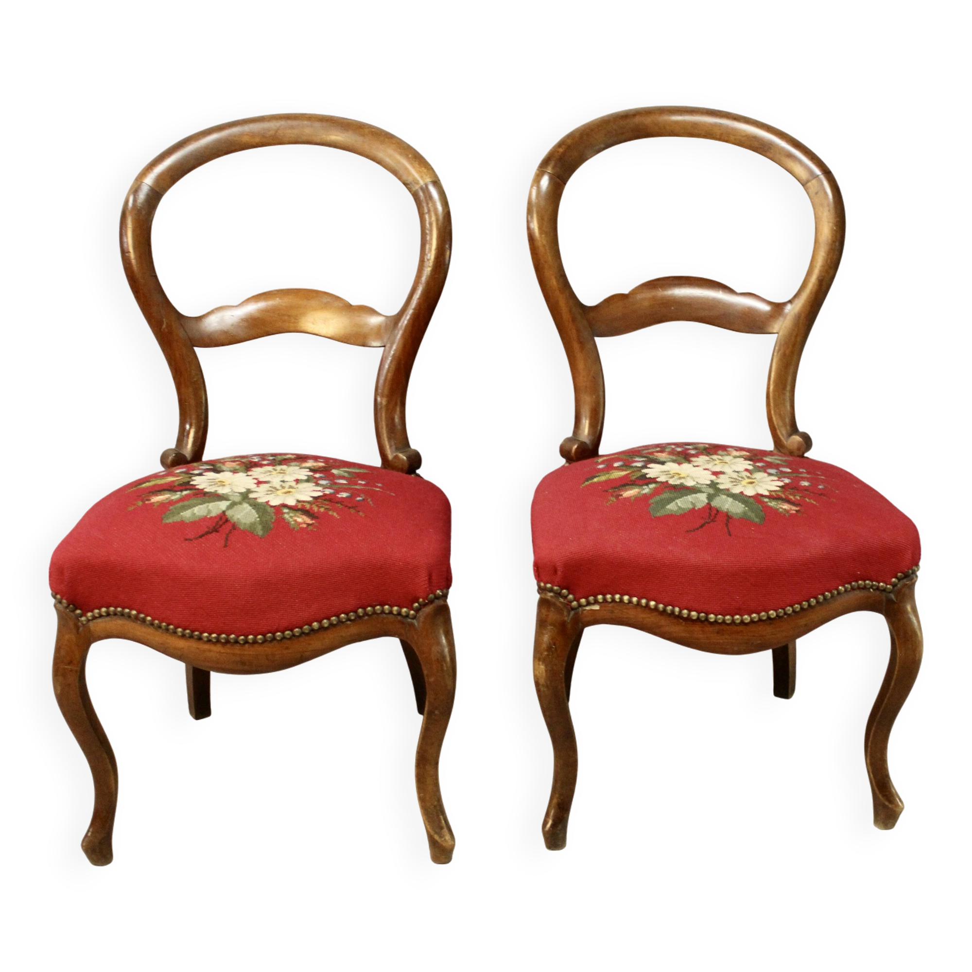 Pair of Louis Philippe walnut chairs, petit point tapestry