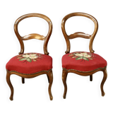Pair of Louis Philippe walnut chairs, petit point tapestry