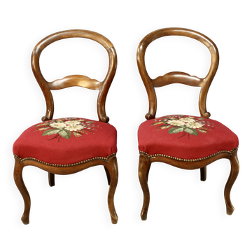 Pair of Louis Philippe walnut chairs, petit point tapestry