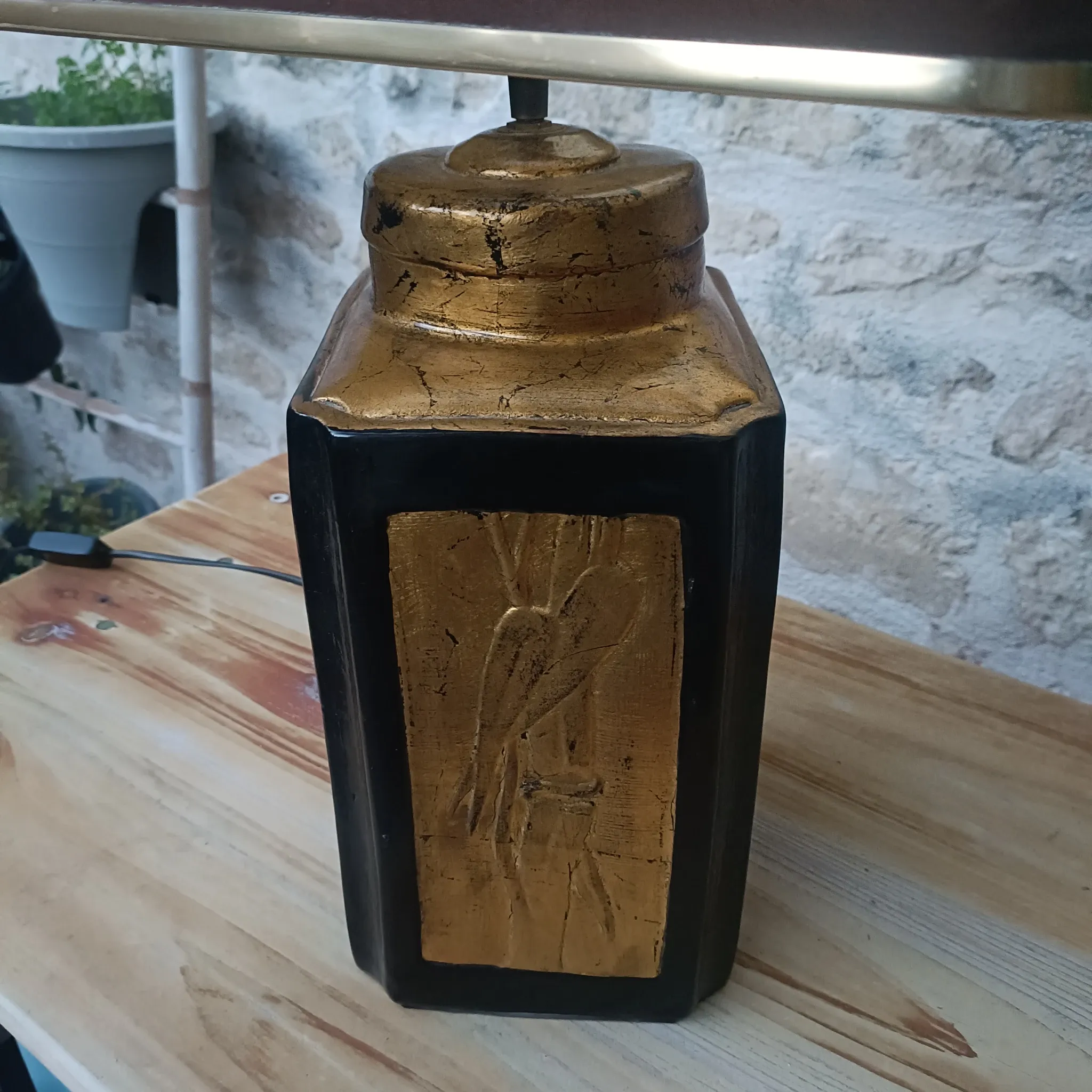 Large ceramic lamp with an Asian theme.
