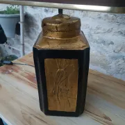 Large ceramic lamp with an Asian theme.
