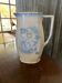 Vintage ceramic pitcher in white and blue from Gránitgyár Budapest, 1960s — floral halo pattern, square handle.