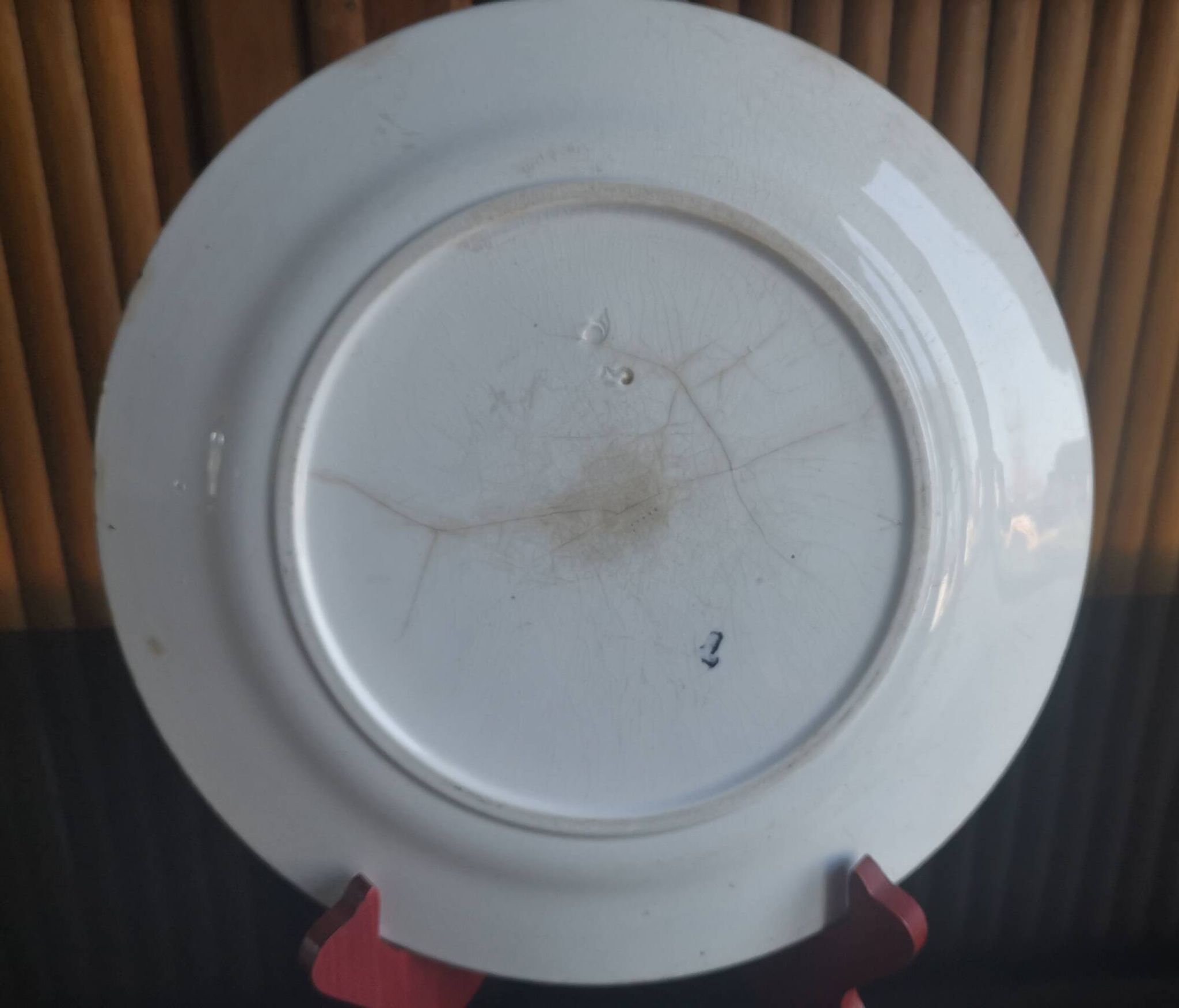 Flat round dish in pink iron earth Earthenware from Onnaing