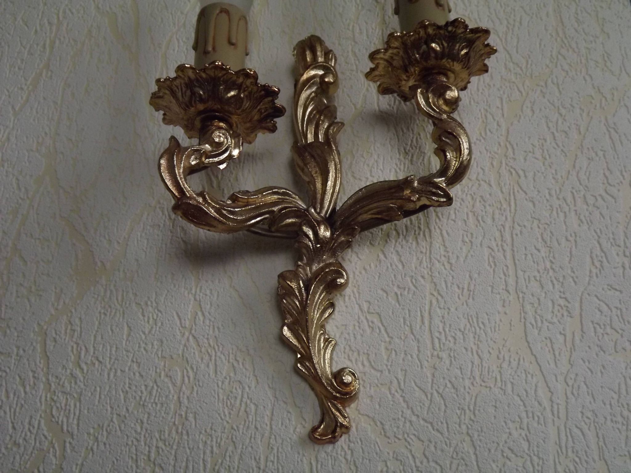 Brass wall lights.