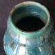 Enamelled ceramic vase, with a flaming blue-green décor