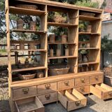 Large antique workshop furniture with drawers and shelves.