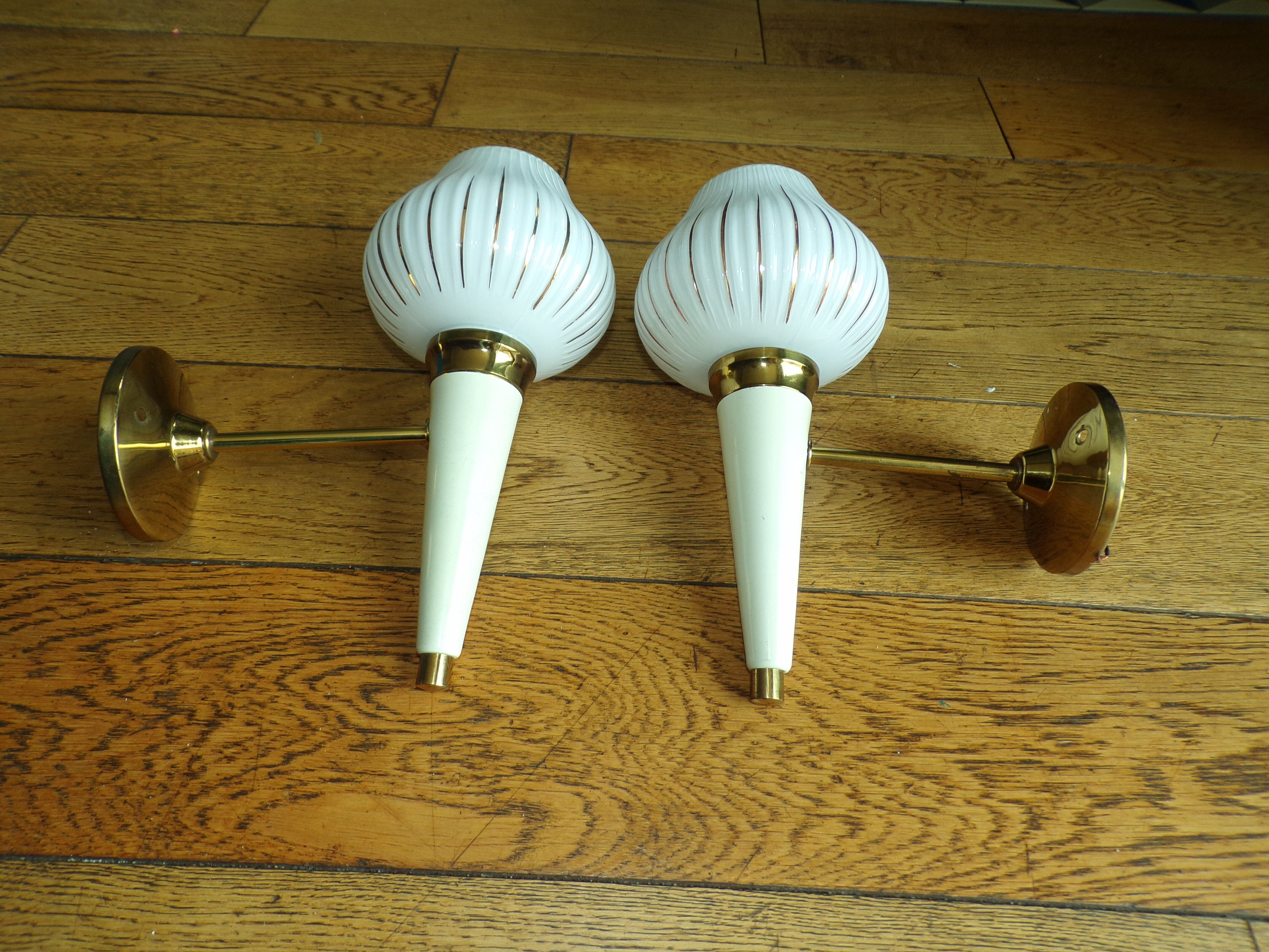 Pair of modernist torch wall light