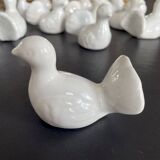 11 zoomorphic ceramic knife rests in white