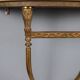 Old neoclassical consoles in gilded bronze from the 20th century.