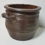 Old varnished sandstone pot