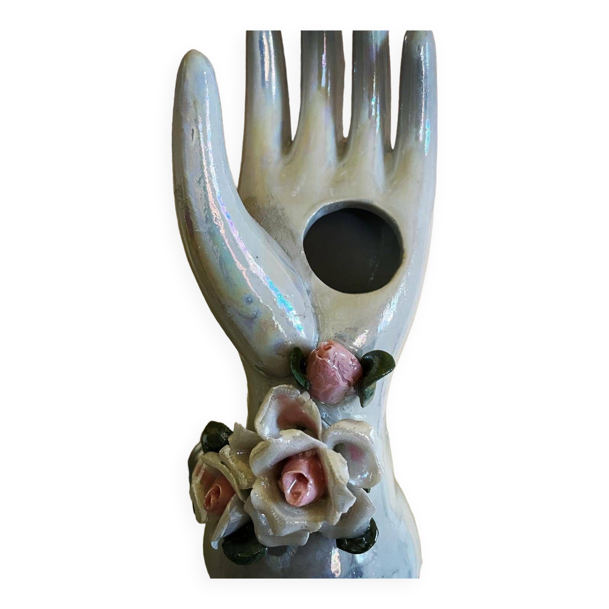 Hand holds jewelry or soliflore