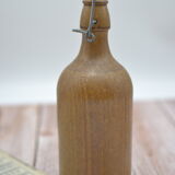 Small wooden sandstone bottle