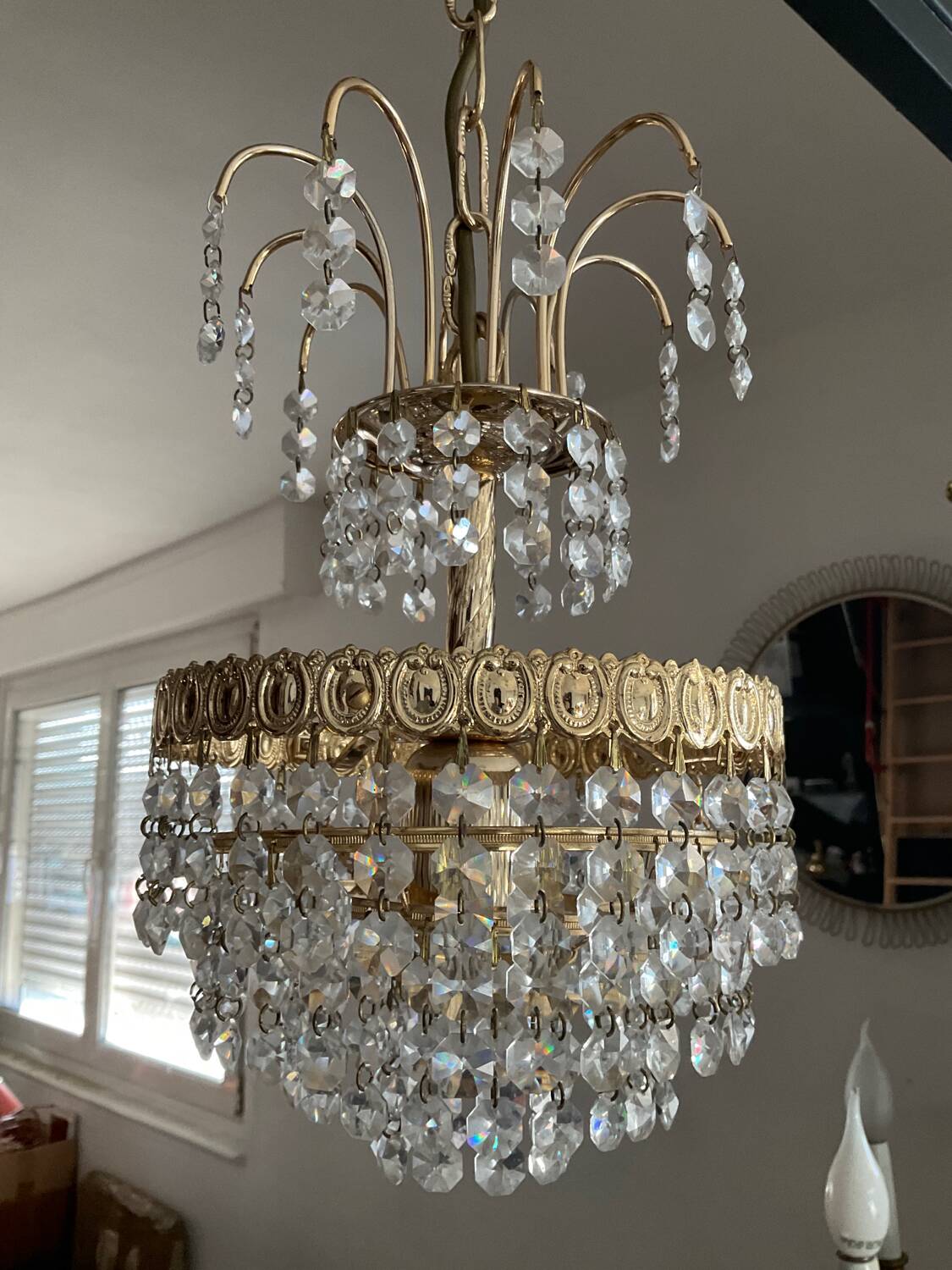 Cascade chandelier with crystal and brass tassels