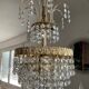 Cascade chandelier with crystal and brass tassels