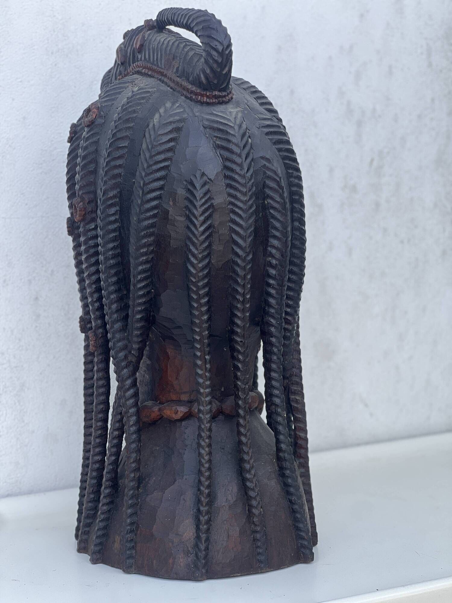 Large wooden bust of an African woman.