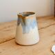 Vintage ceramic milk jug with a blue and taupe gradient glaze.