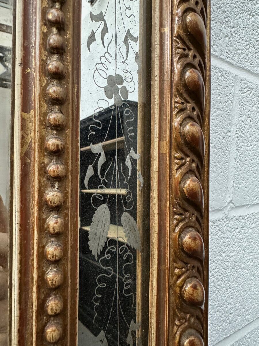 19th-century mirror with cherubs