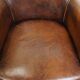 Amazing cognac-coloured sheepskin dining/side chair with armrests