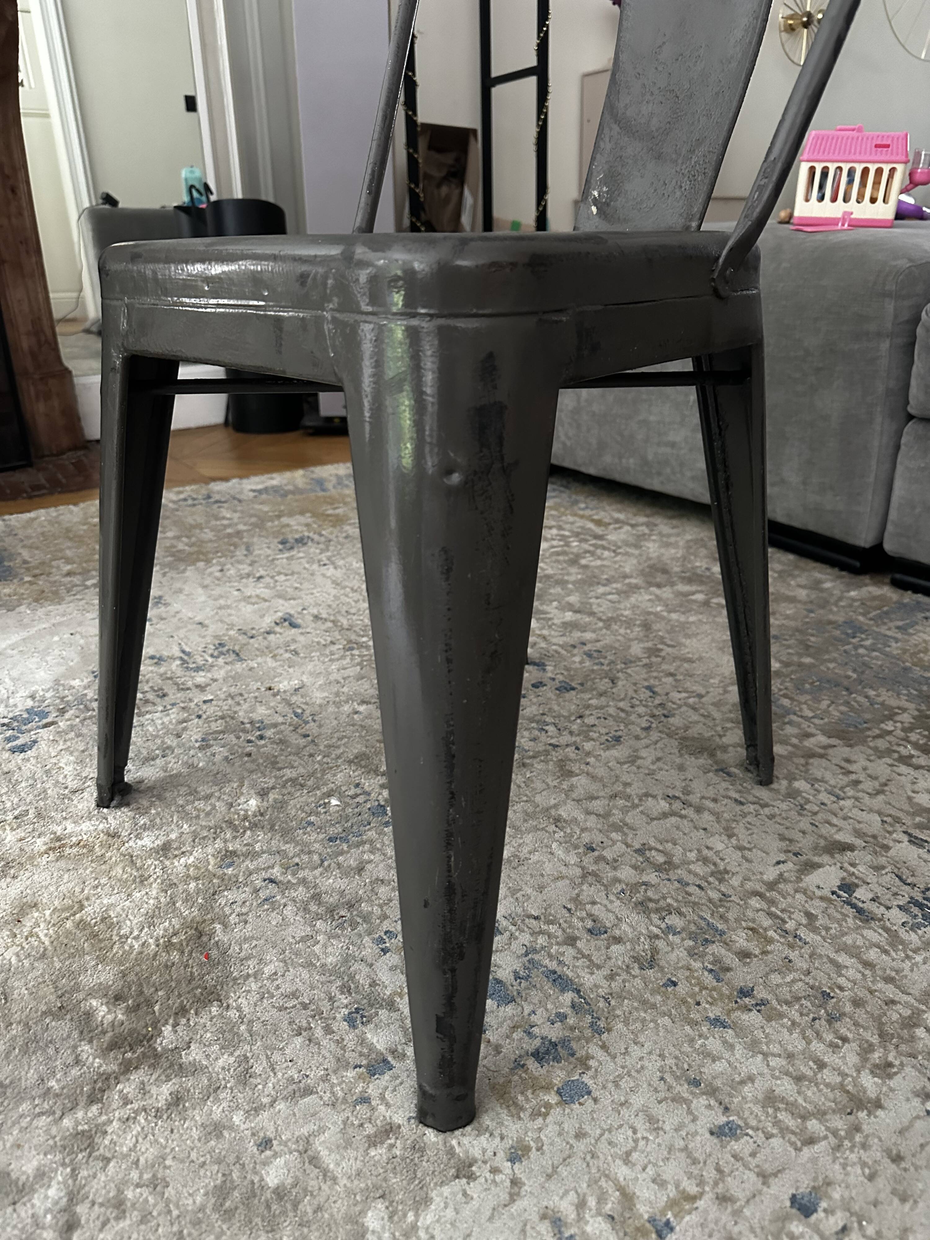 Pair of vintage Tolix model A chairs, designed by Xavier Pauchard.