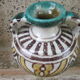 Coloured ceramic vase: arabesques, with Arabic inscription
