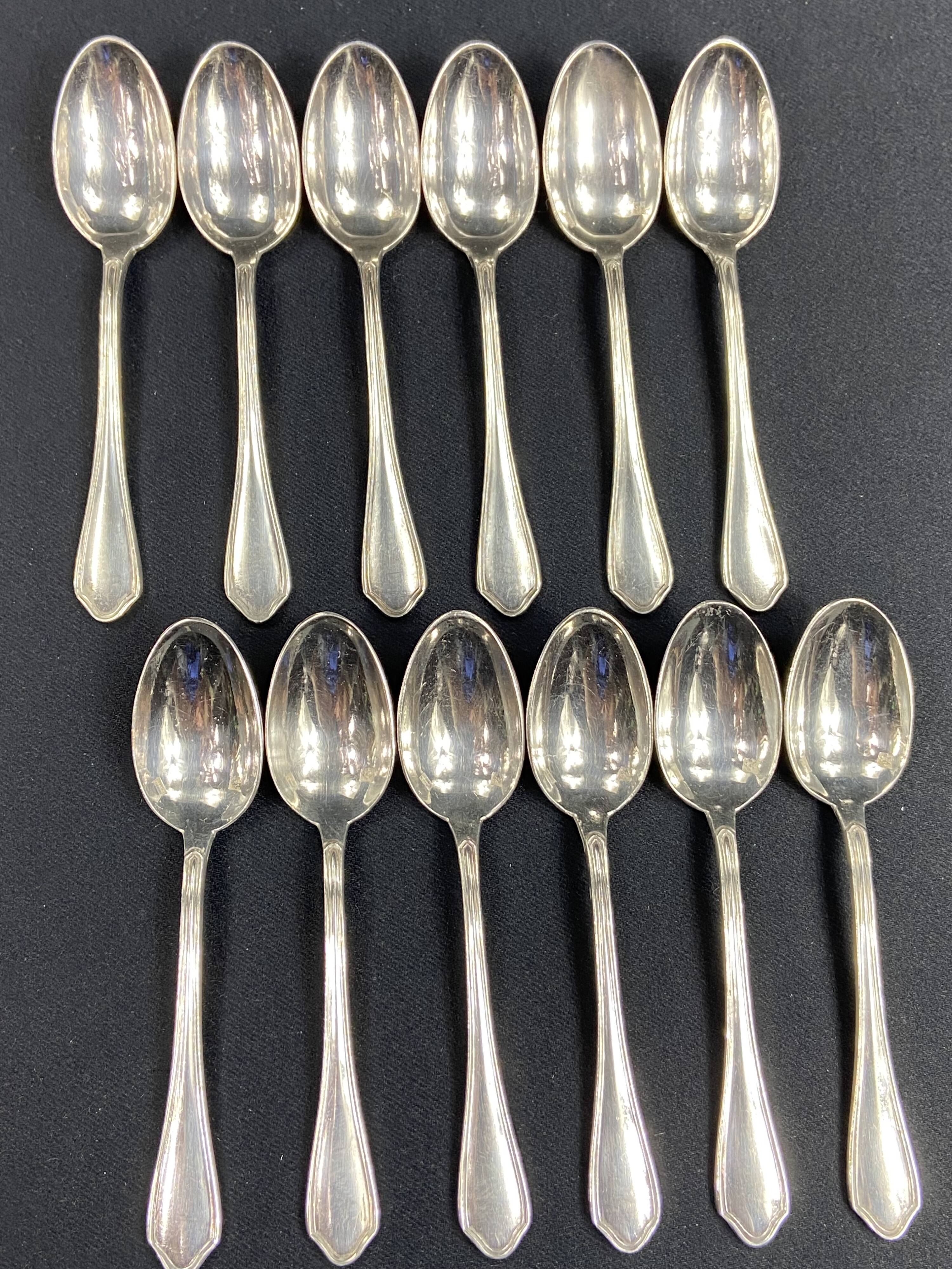 Complete set of 12 Louis XV style mocha spoons in silver-plated metal, Hermès