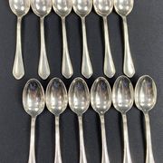 Complete set of 12 Louis XV style mocha spoons in silver-plated metal, Hermès