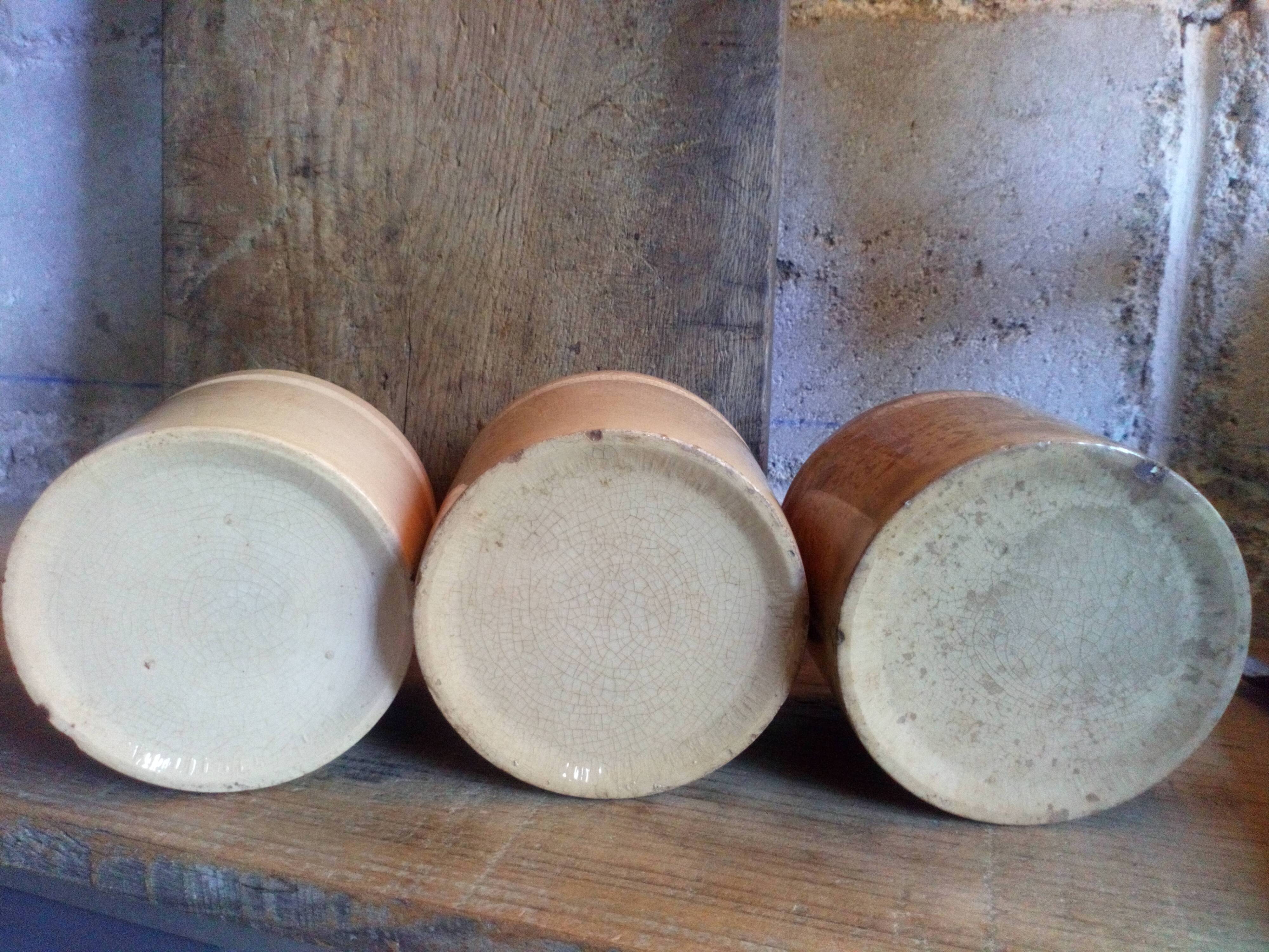 Three XXeme jam jars in glazed earth