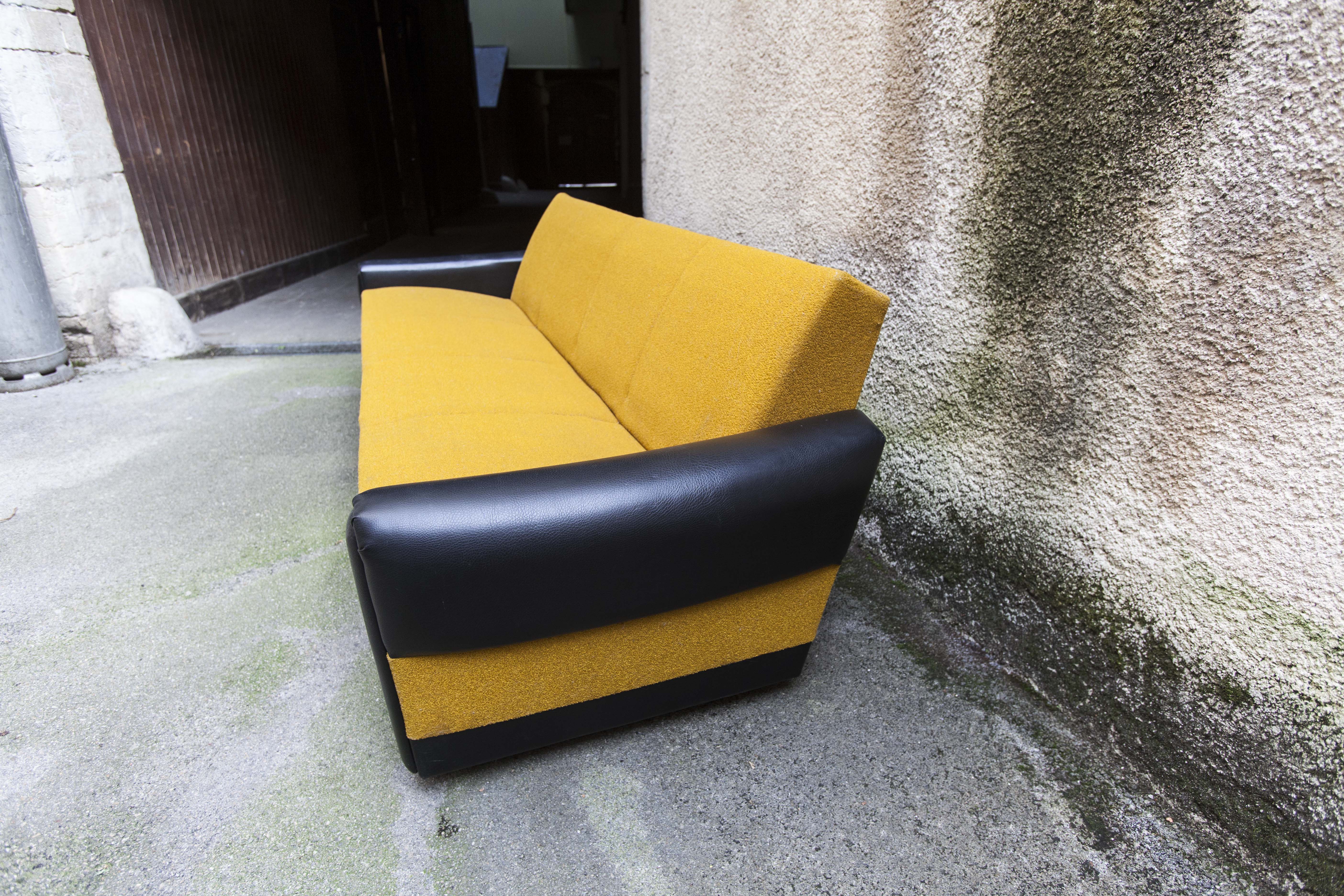 The 1970s gold and black Daybed couch