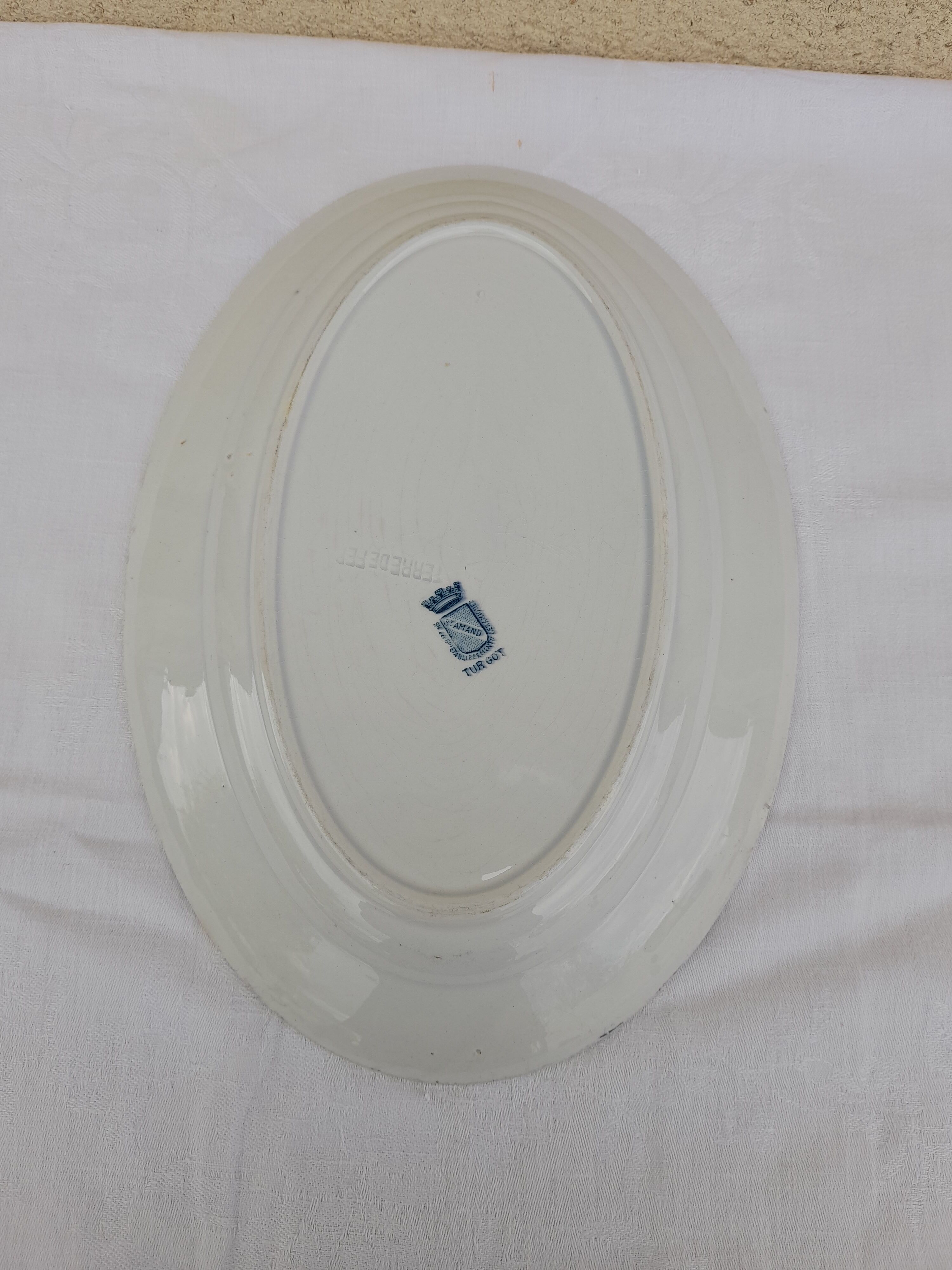 Oval dish in Earthenware of Saint Amand model turgot Iron Earth diam 35.5 cm