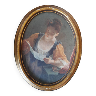 Old golden oval frame, reproduction of Jean Raoux's reader