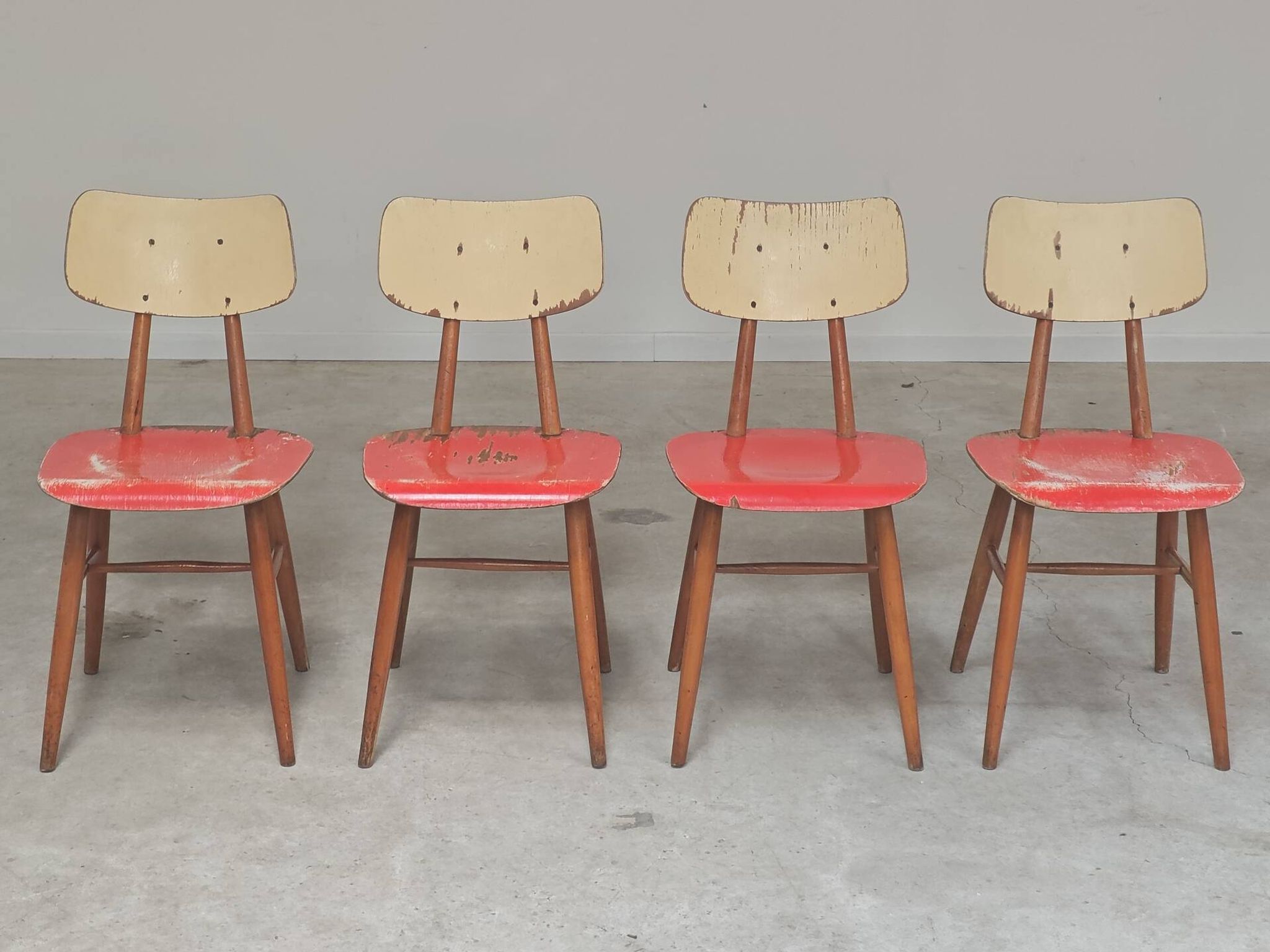 Set of 4 Ton (Thonet) red wooden chairs from the 1960s.
