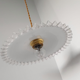 Suspension opaline crantelée