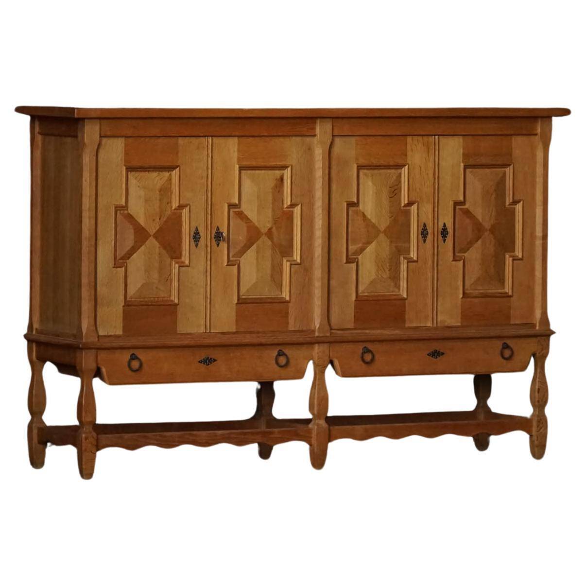 Henning Kjærnulf, enfilade in oak, mid-century Danish, Nyrup Møbelfabrik, 1960s.