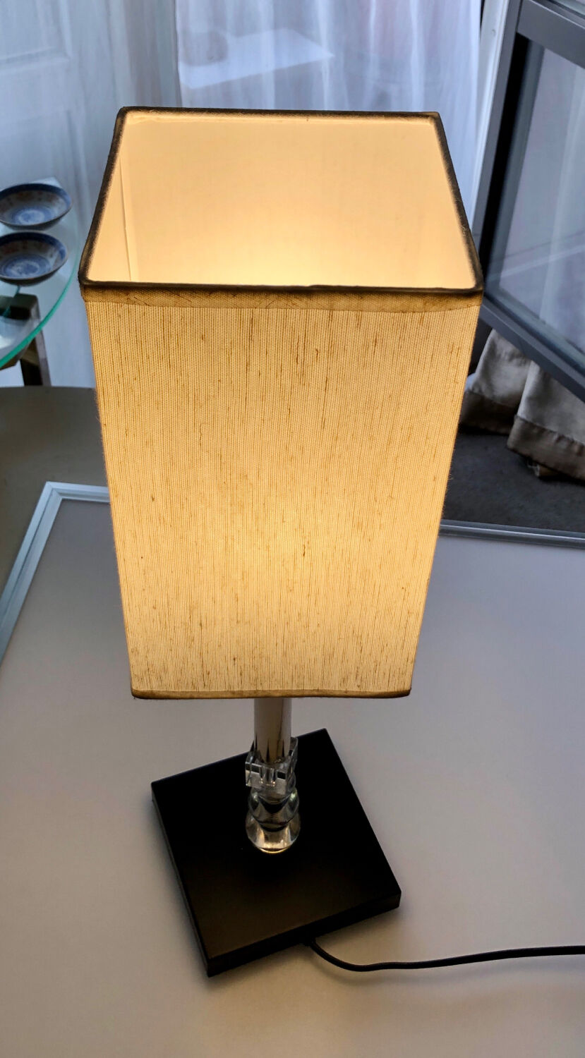 Silver floor lamp with a straight shade.