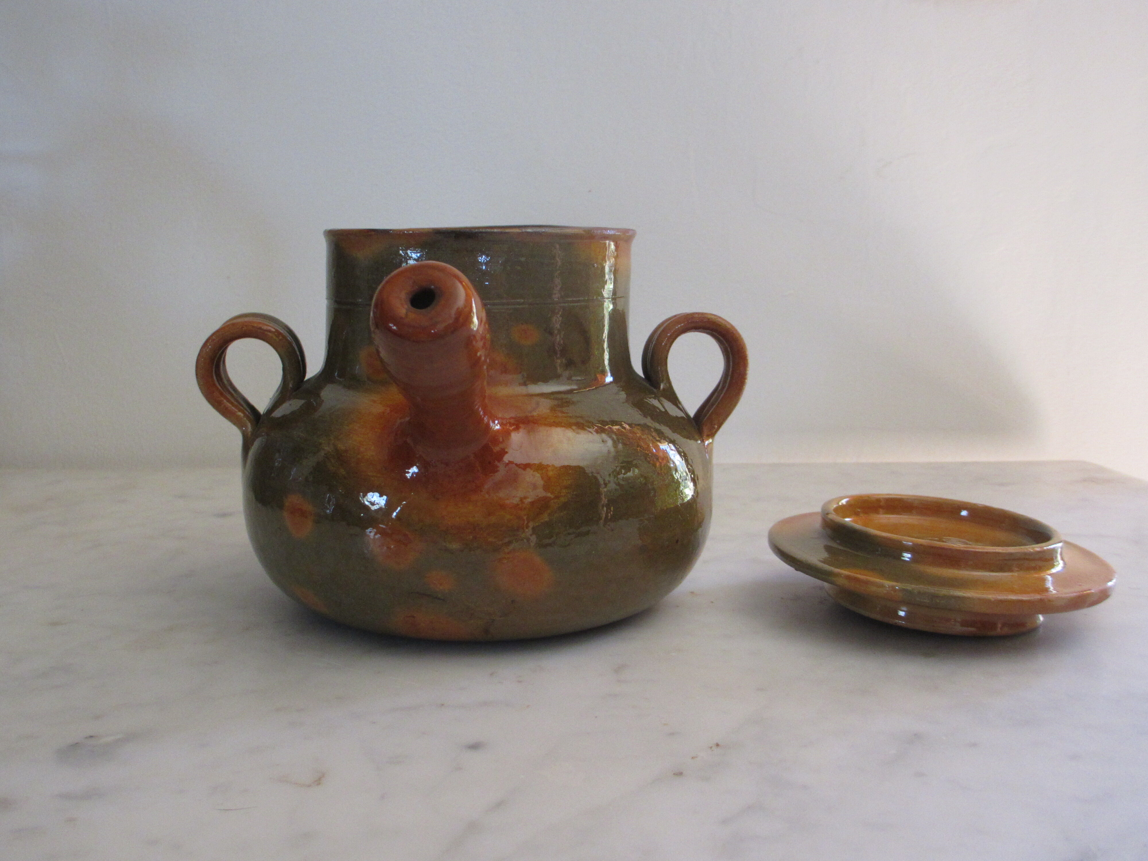 Pignate (in Provence) or glazed terracotta pot.