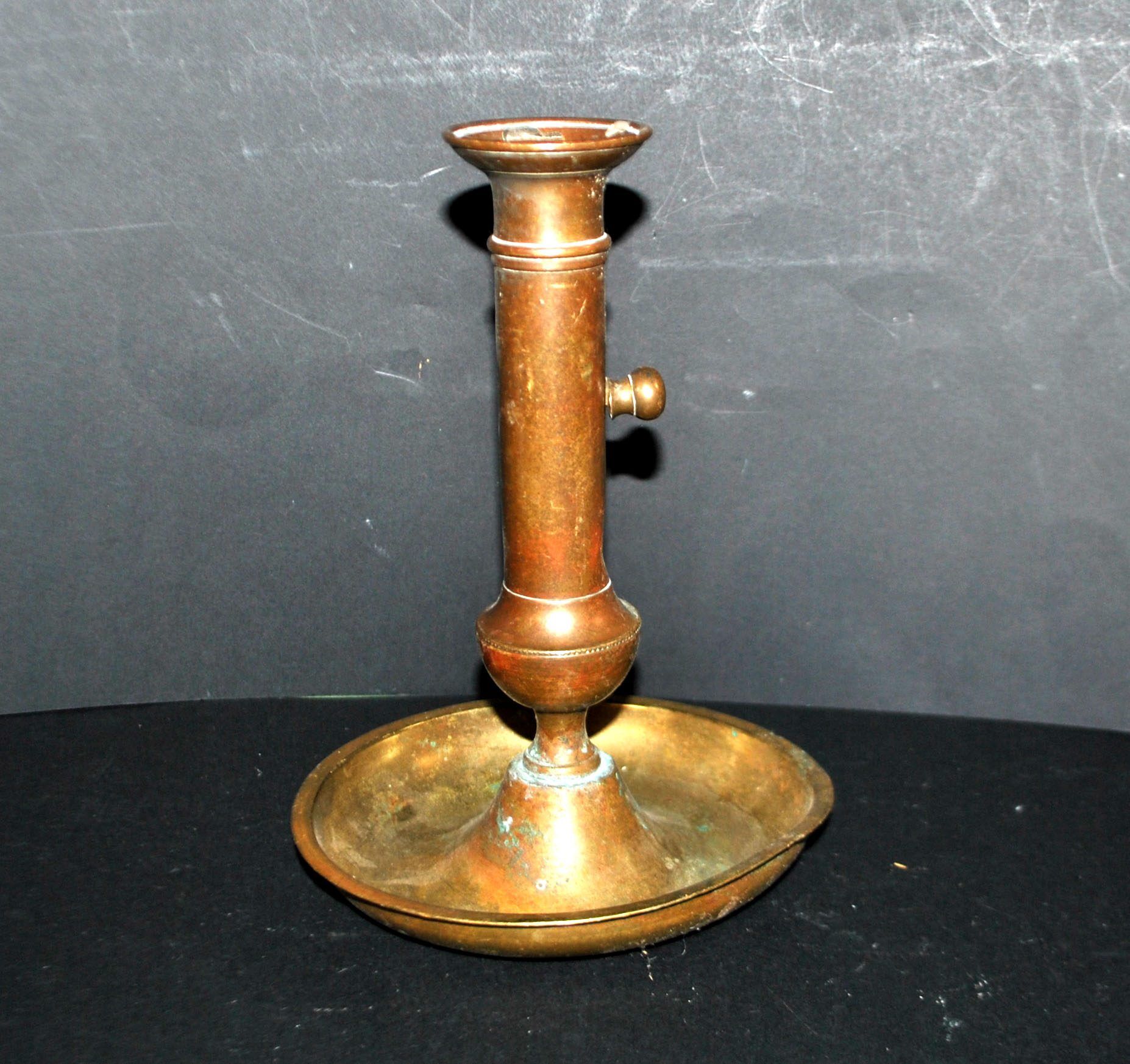Antique push candle holder, 18th century gilded carved bronze candlestick.