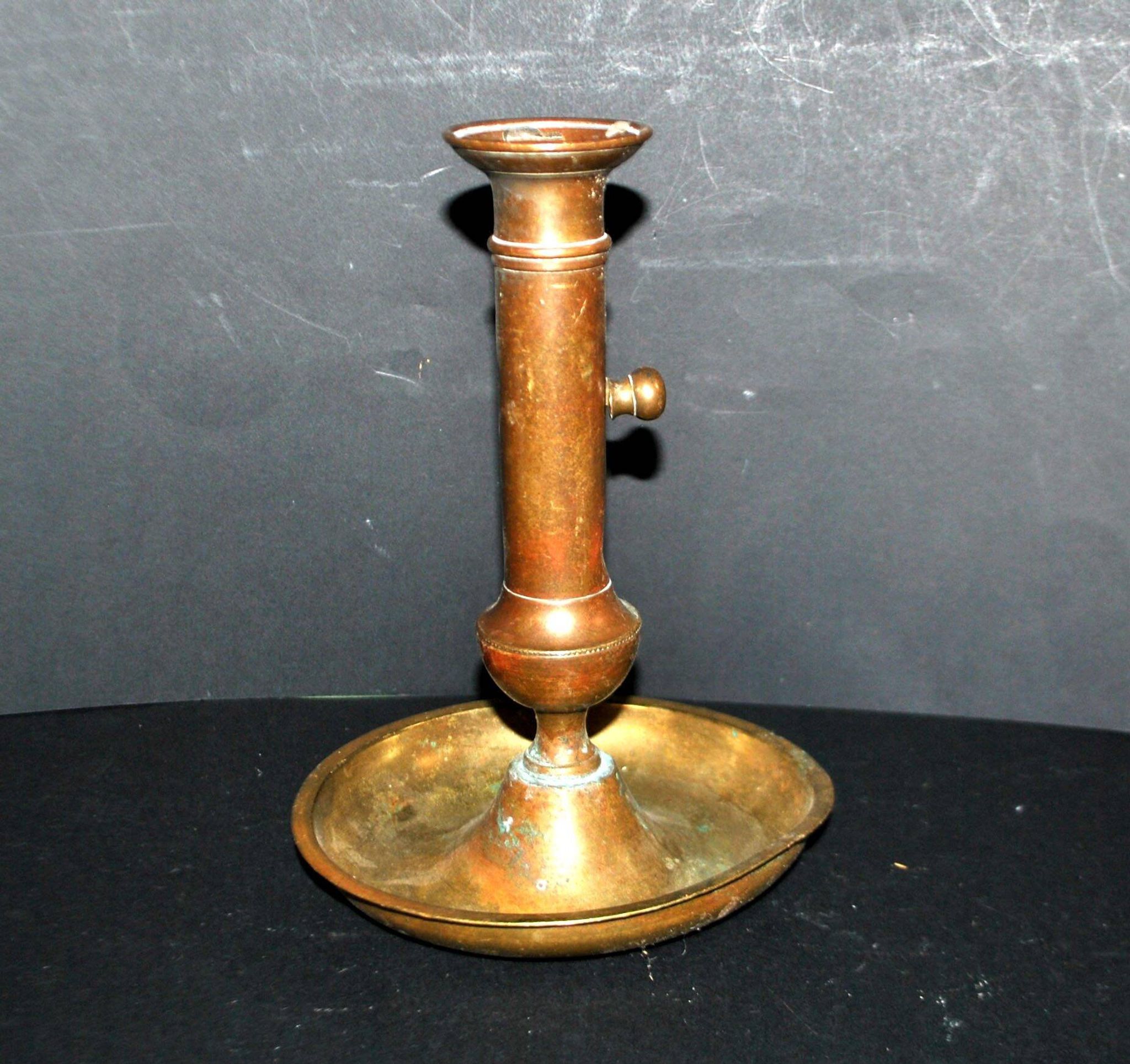 Antique push candle holder, 18th century gilded carved bronze candlestick.