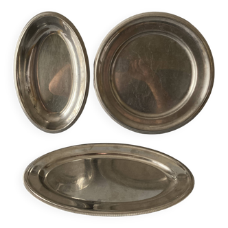 Set of three Letang & Remy stainless steel dishes.